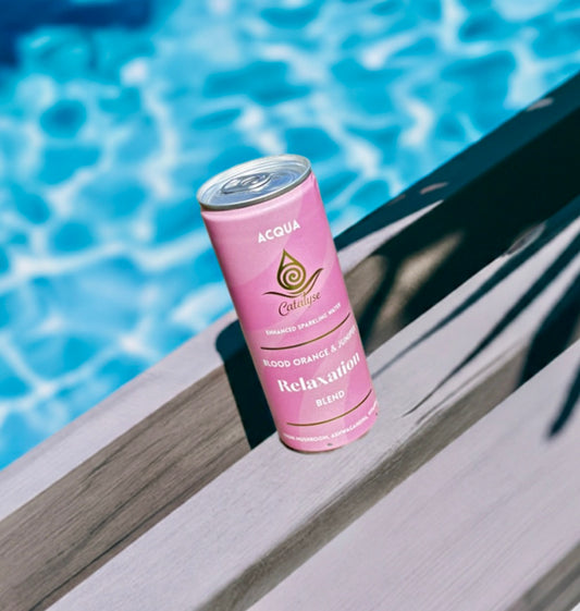 Acqua relaxation drink with blood orange and juniper, inspired by forest bathing and mindful rituals.