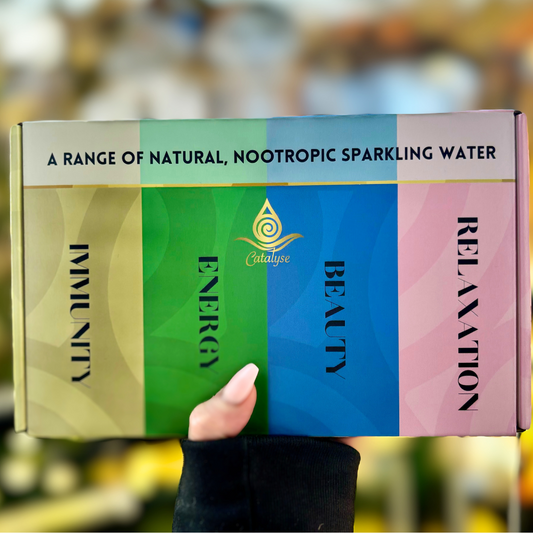 Catalyse mixed sampler case styled as a wellness gift, featuring four functional sparkling drink blends.